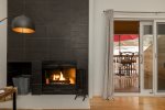A cozy and contemporary wood-burning fireplace for winter